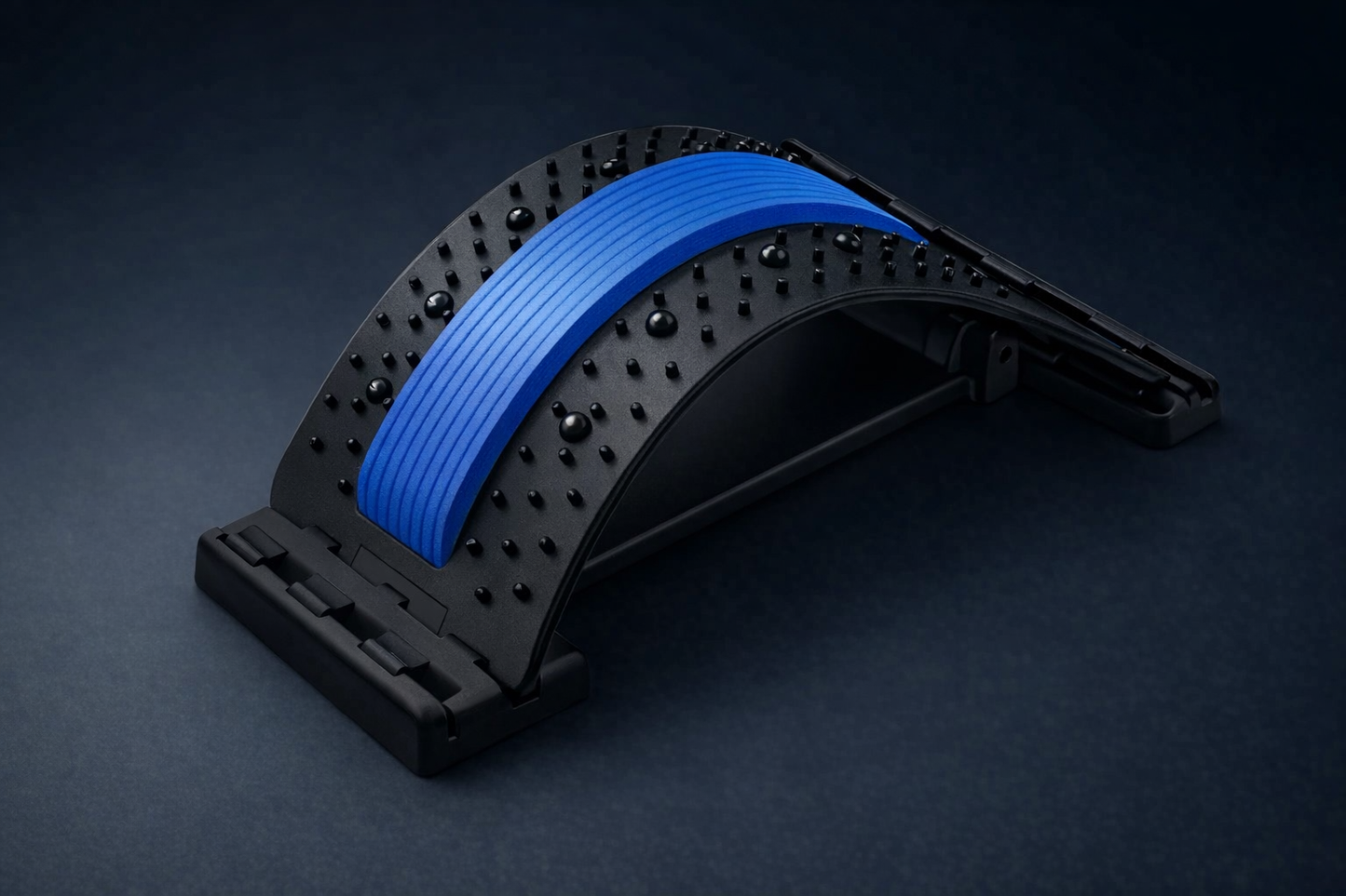 Lumbar decompression back stretcher with acupressure nodes and blue comfort band for back pain relief.